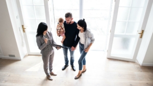 Real estate agent with her clients